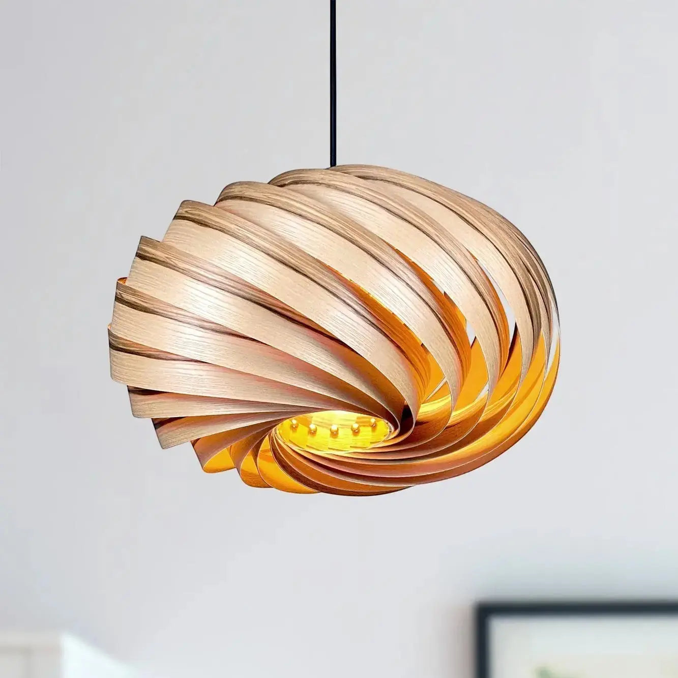 Gofurnit Quiescenta pendant lamp shade made of olive ash wood with a unique swirling design, 45cm diameter.